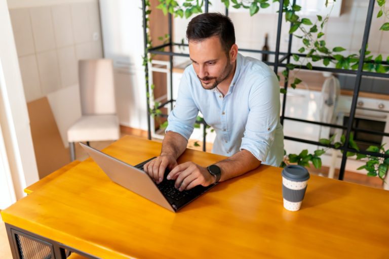 Man using laptop computer